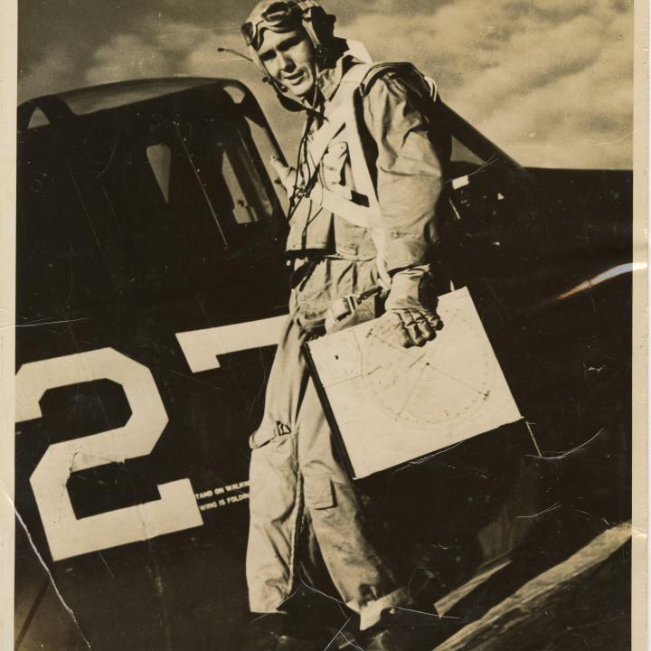 Primary Image of Elisha "Smokey" Stover Exiting his F6F Hellcat after his 7,000th Landing