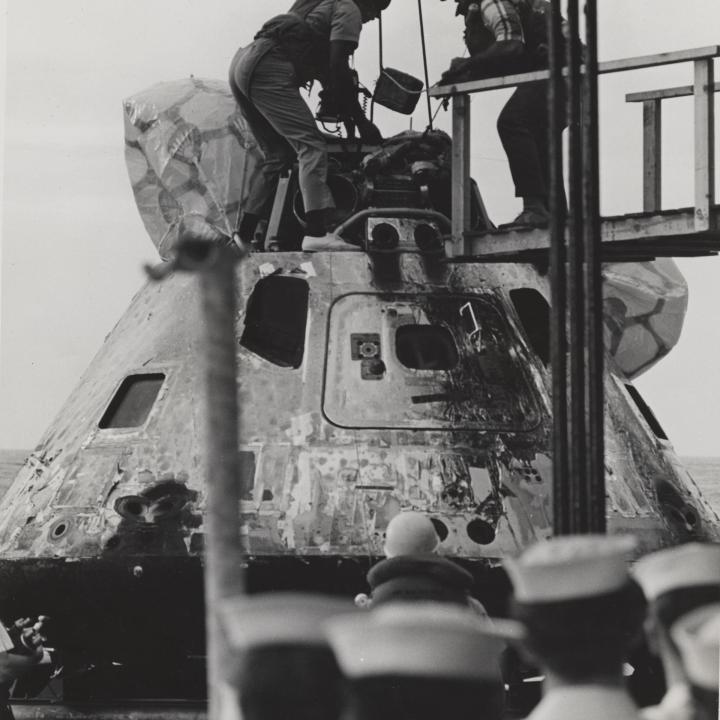 Primary Image of The Crew of The USS Yorktown (CVS-10) Work to Unhook Apollo 8