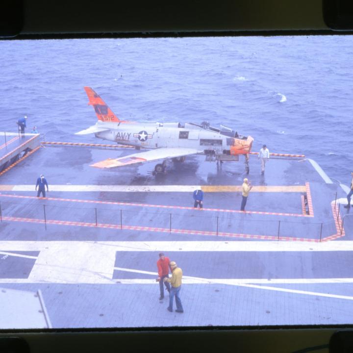 Primary Image of FJ Fury Riding on an Aircraft Elevator