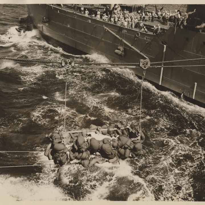 Primary Image of Richard Arnicar Being Transported Following His Plane Accident While Aboard the USS Yorktown (CVA-10)