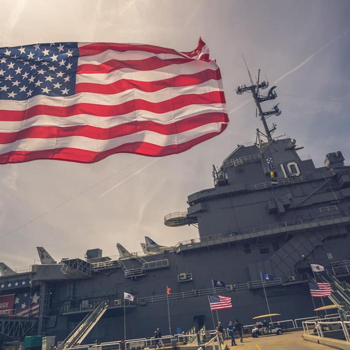 Flag waving in front of Patriots Point