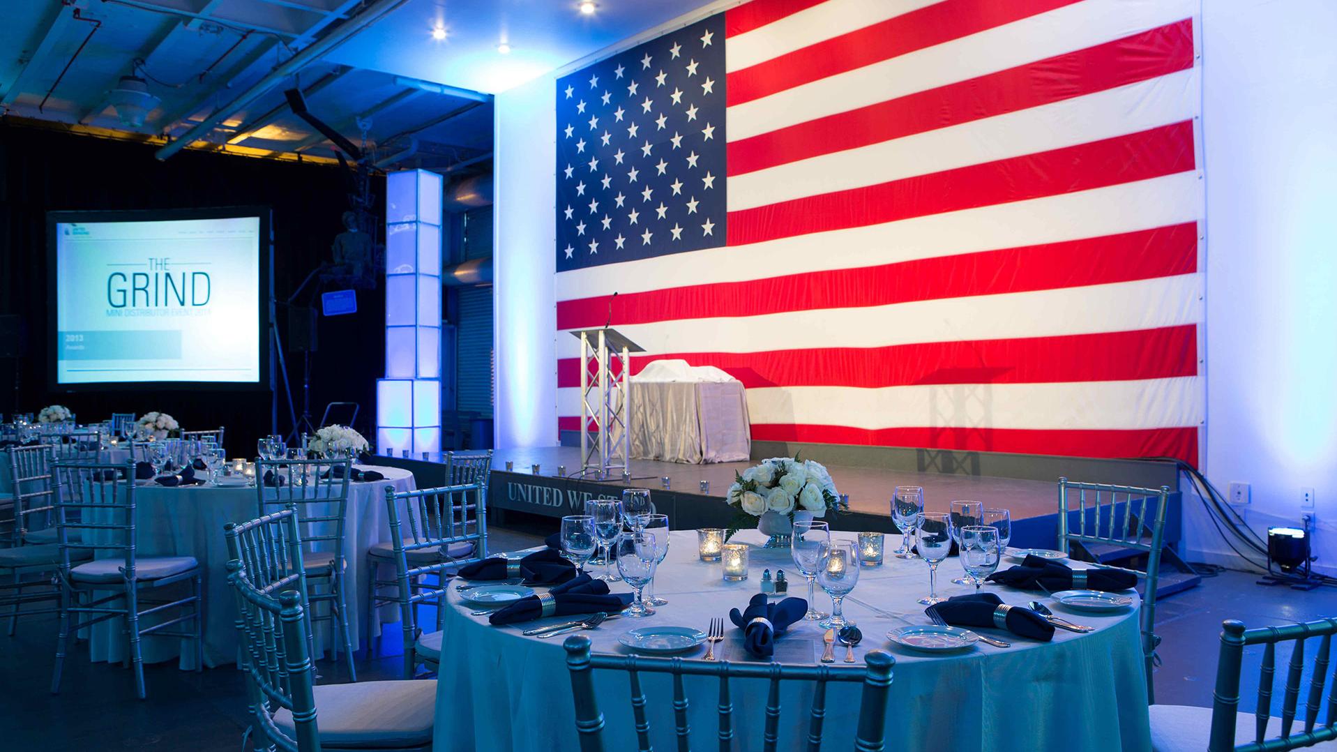 Round tables set up in the Hangar Bay