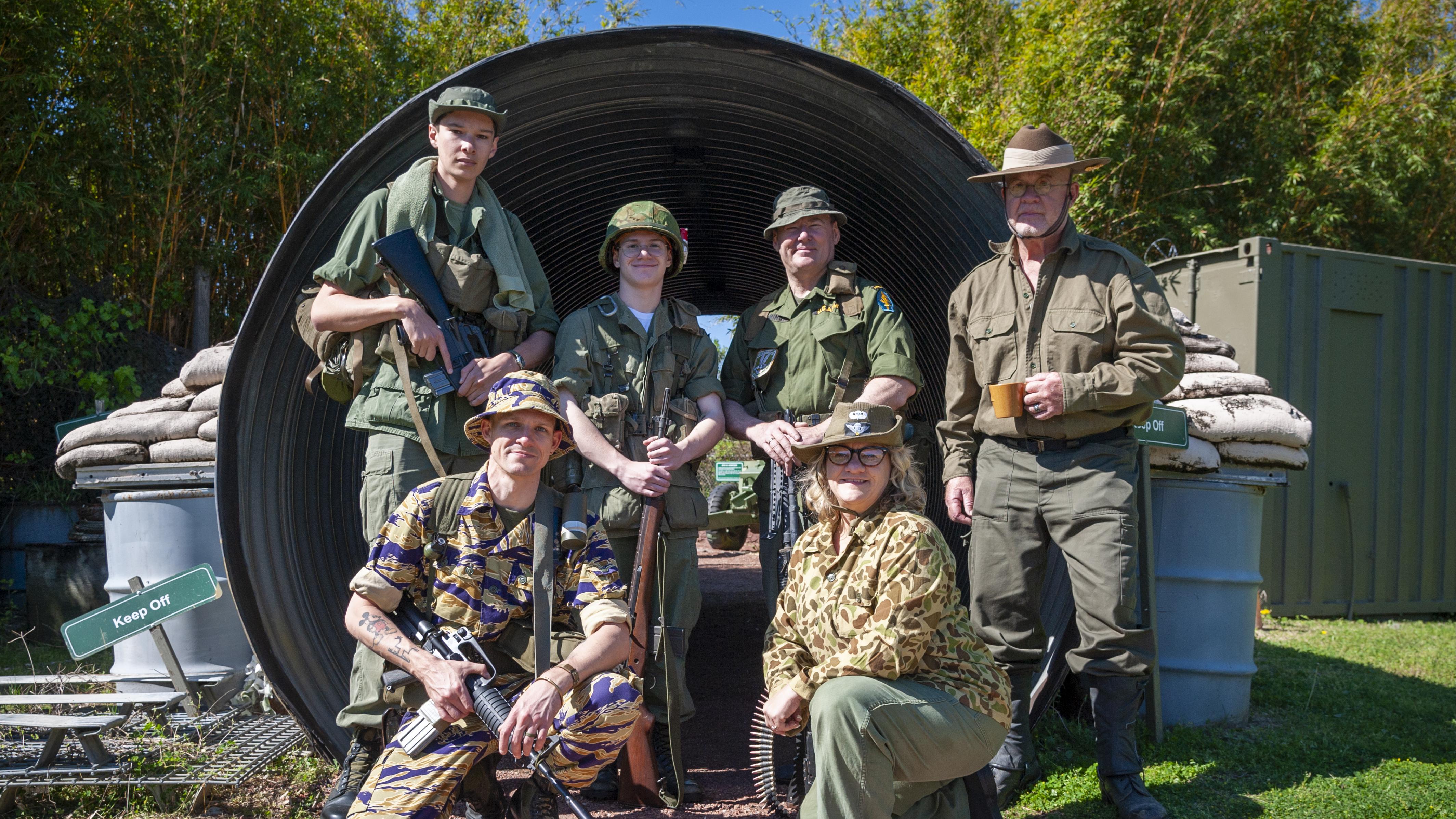 A group of historical reenactors pose in the Vietnam Experience. 