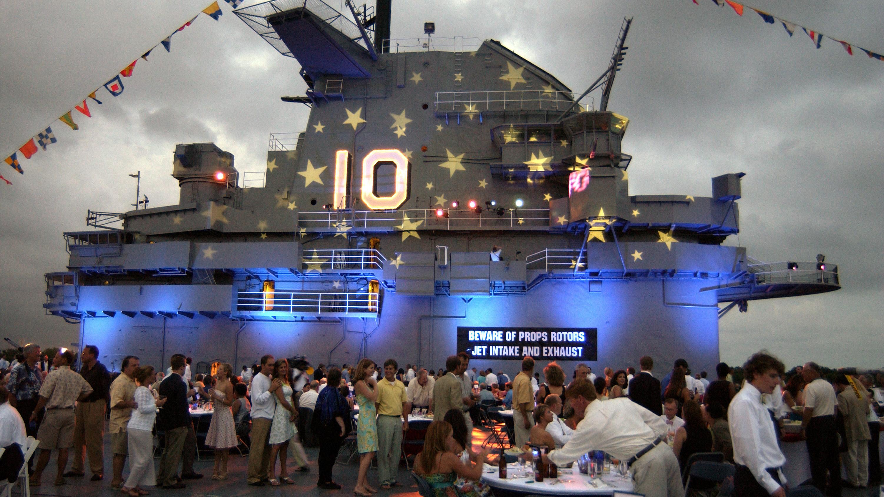 image of an evening event on the flight deck of the USS Yorktown