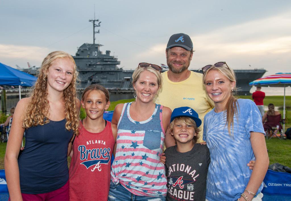 Family standing outside Patriots Point for the Fireworks