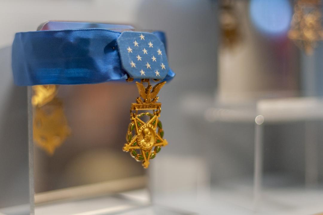 A Medal of Honor sits in a display case at the Medal of Honor Museum at Patriots Point.