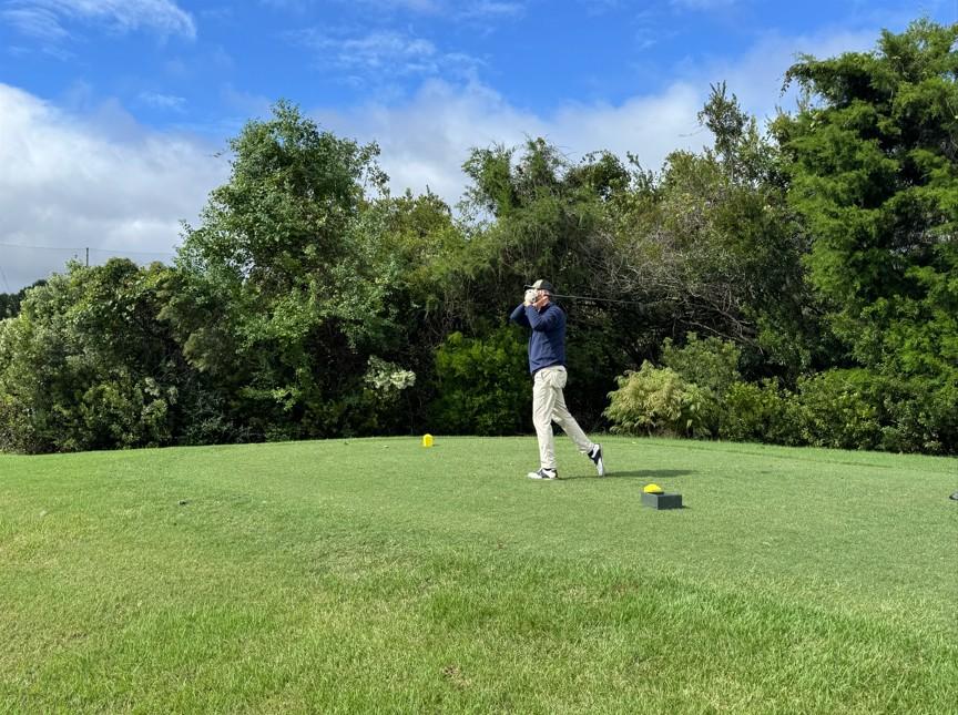 A man golfing