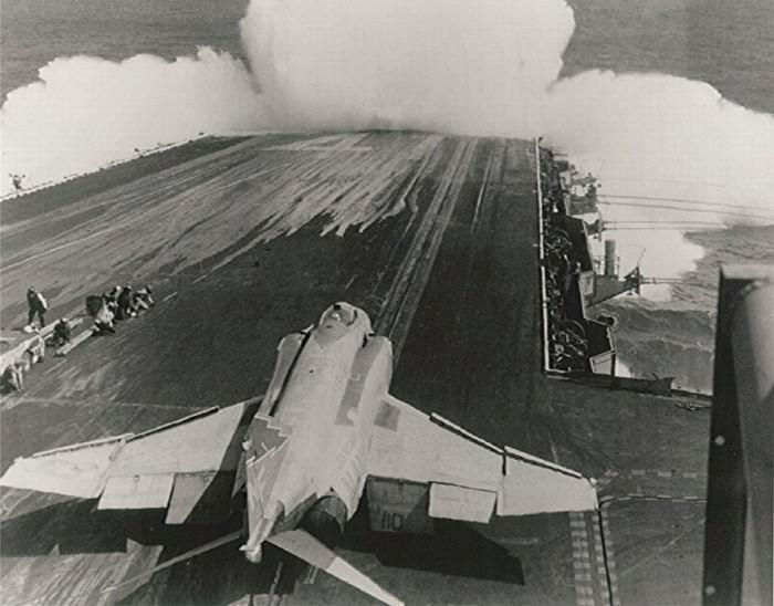 Aircraft taking off of flight deck. 