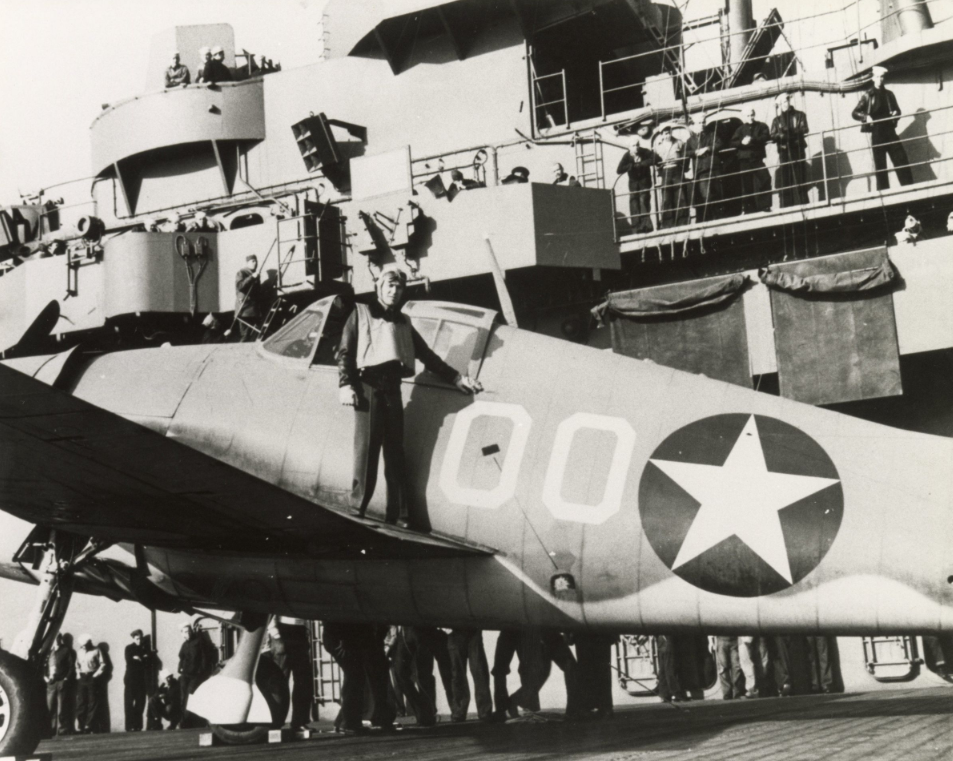 Jimmy Flatley posing in front of an aircraft
