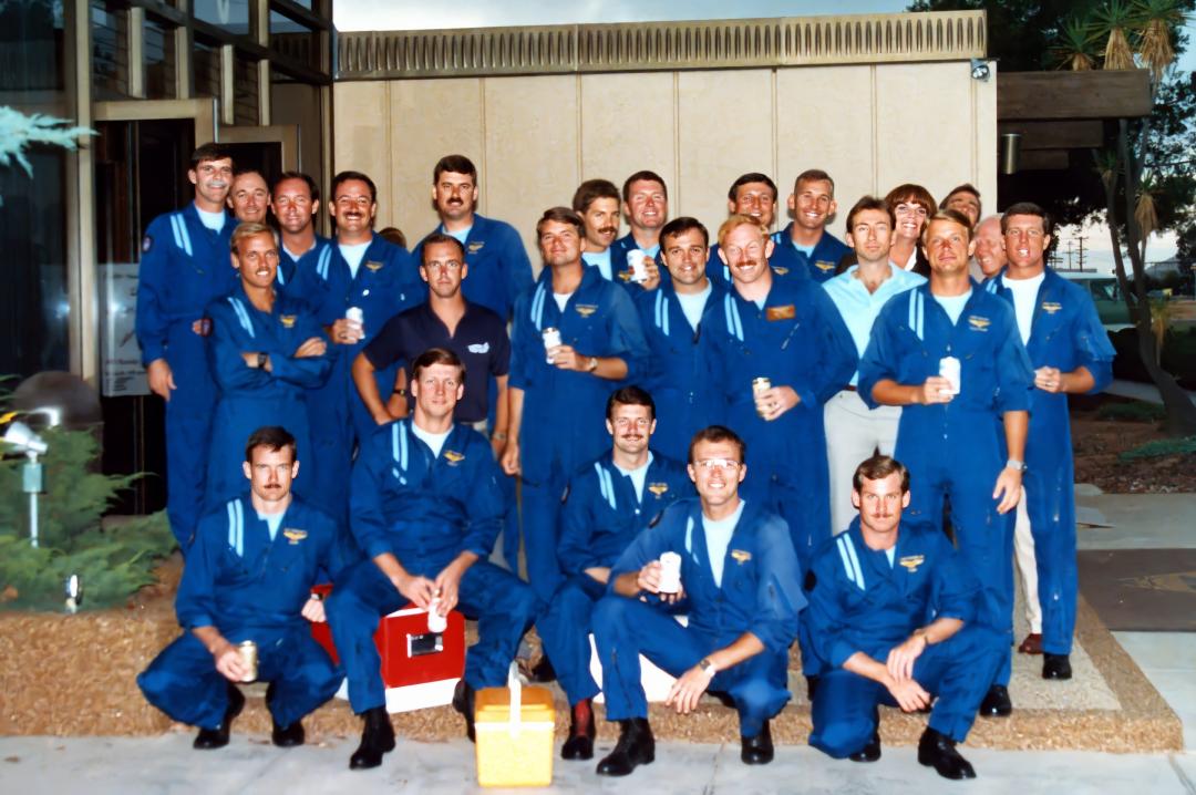 Group of airmen pose for a photo. 