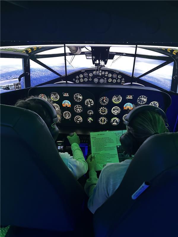 Students taking flight academy courses