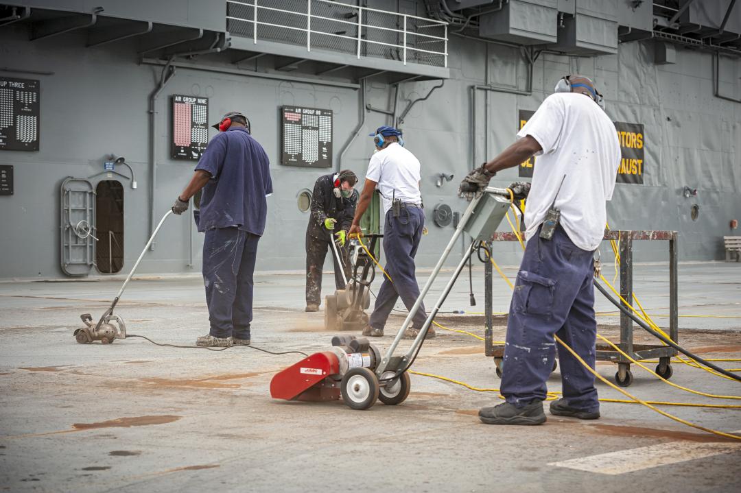 Maintenance team preparing the flight deck for restoration