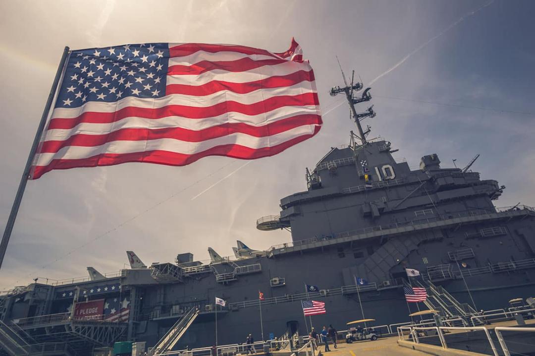 Flag waving in front of Patriots Point