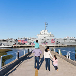 Family walking towards Patriots Point